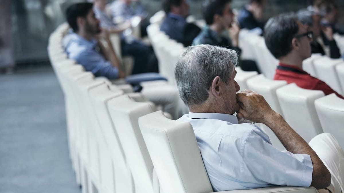 seated adult audience at a lecture