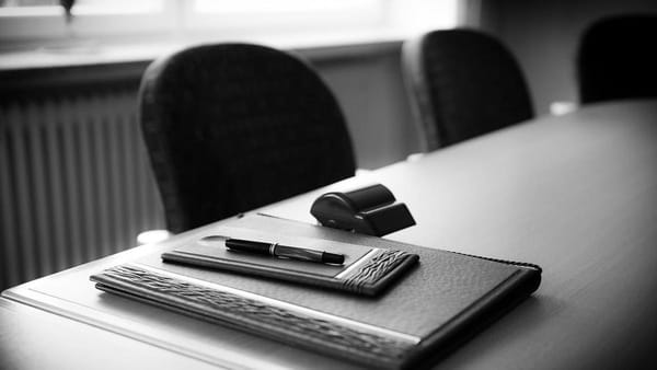 official-looking empty desk for signing legal papers