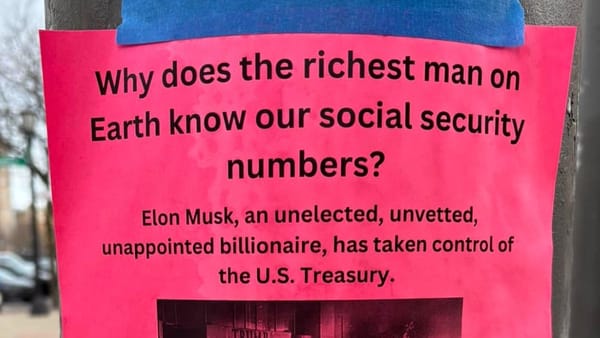 pink flyer on a utility pole. It says: Why does the richest man on Earth know our social security numbers?