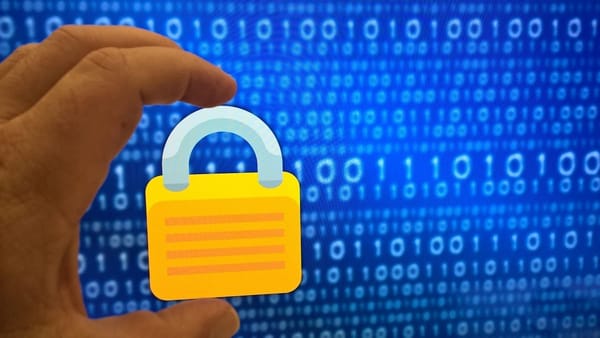 photo of hand holds an illustrated yellow lock